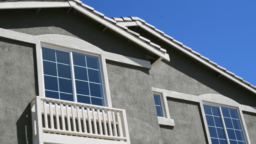 Double glazed windows on a grey house